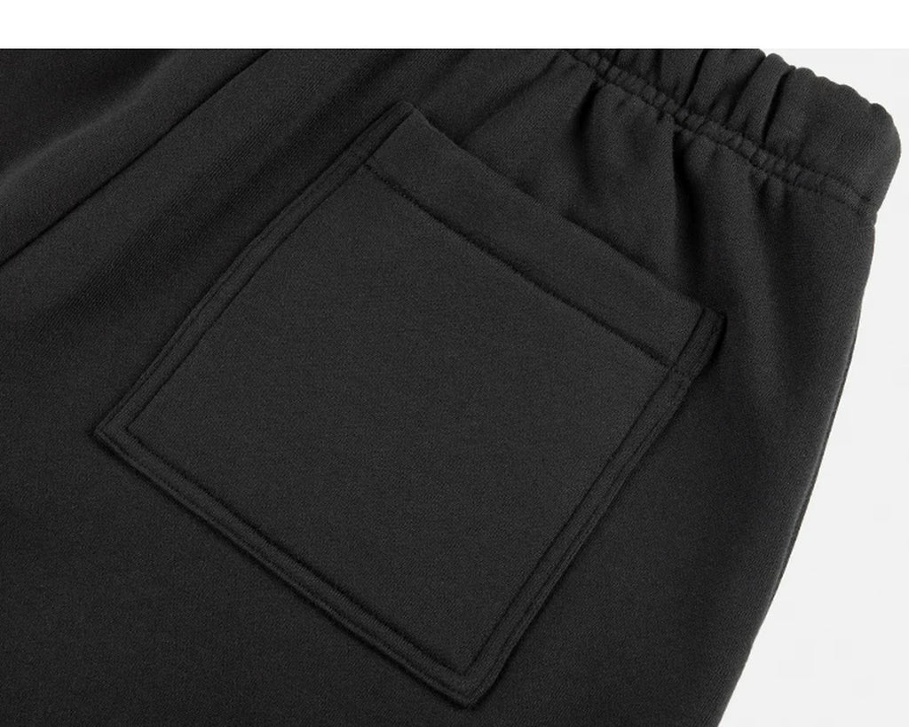 IDLT joggers, black back pocket.