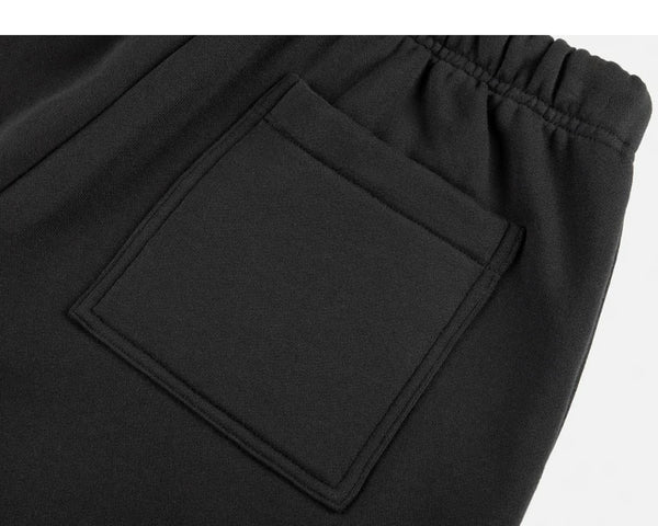 IDLT joggers, black back pocket.