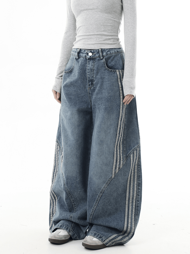 Deconstructed Triple‑Stripe Wide‑Leg Jeans Main Image