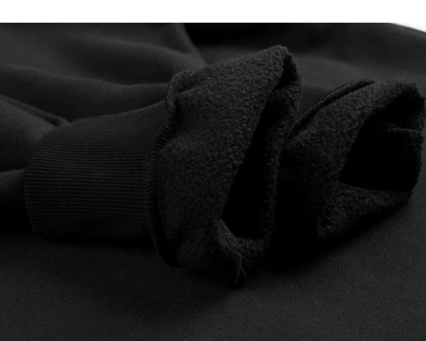 IDLT sweatshirt, black fleece cuff lining.