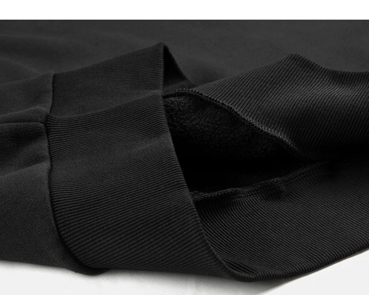 IDLT sweatshirt, black ribbed hem.