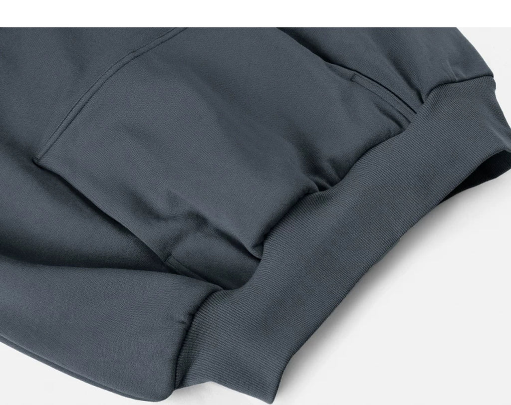 IDLT hoodie, dark gray kangaroo pocket and hem.