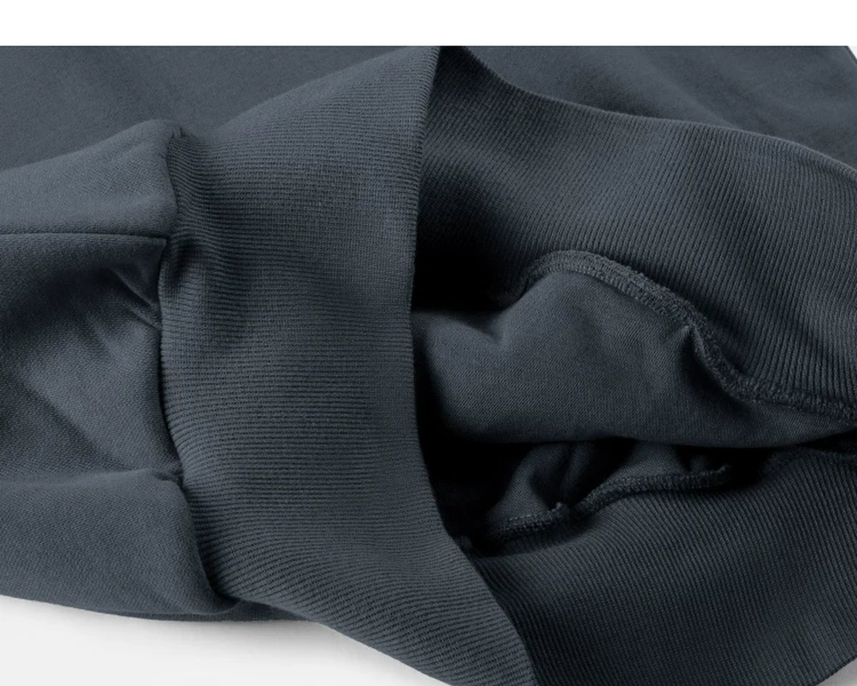 IDLT hoodie, dark gray inner ribbed hem.