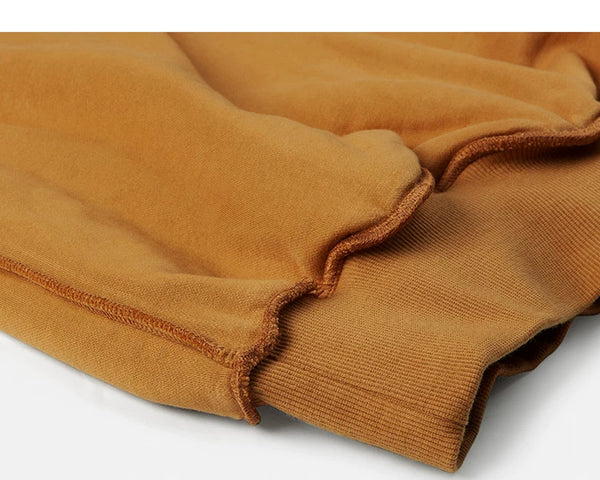 IDLT hoodie, camel inner cuff seams.