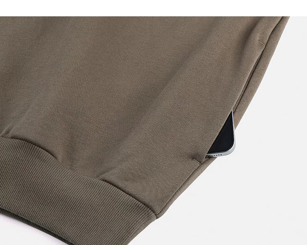 IDLT sweatshirt, brown side pocket.