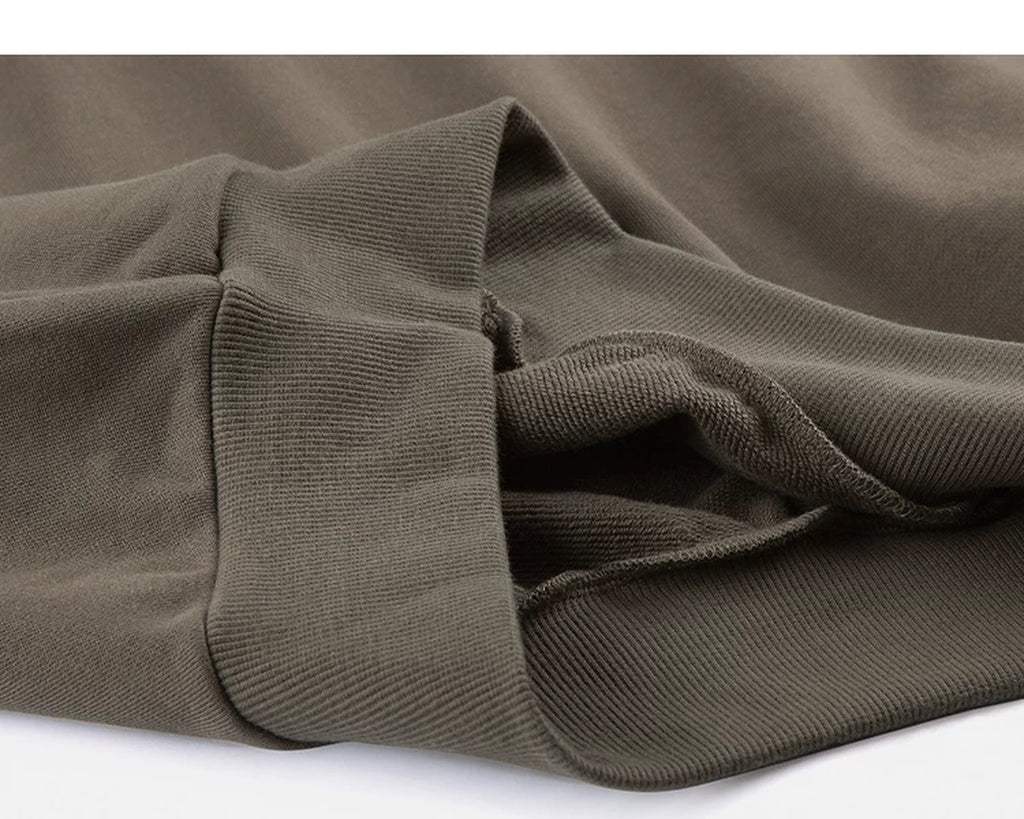 IDLT sweatshirt, brown ribbed hem.