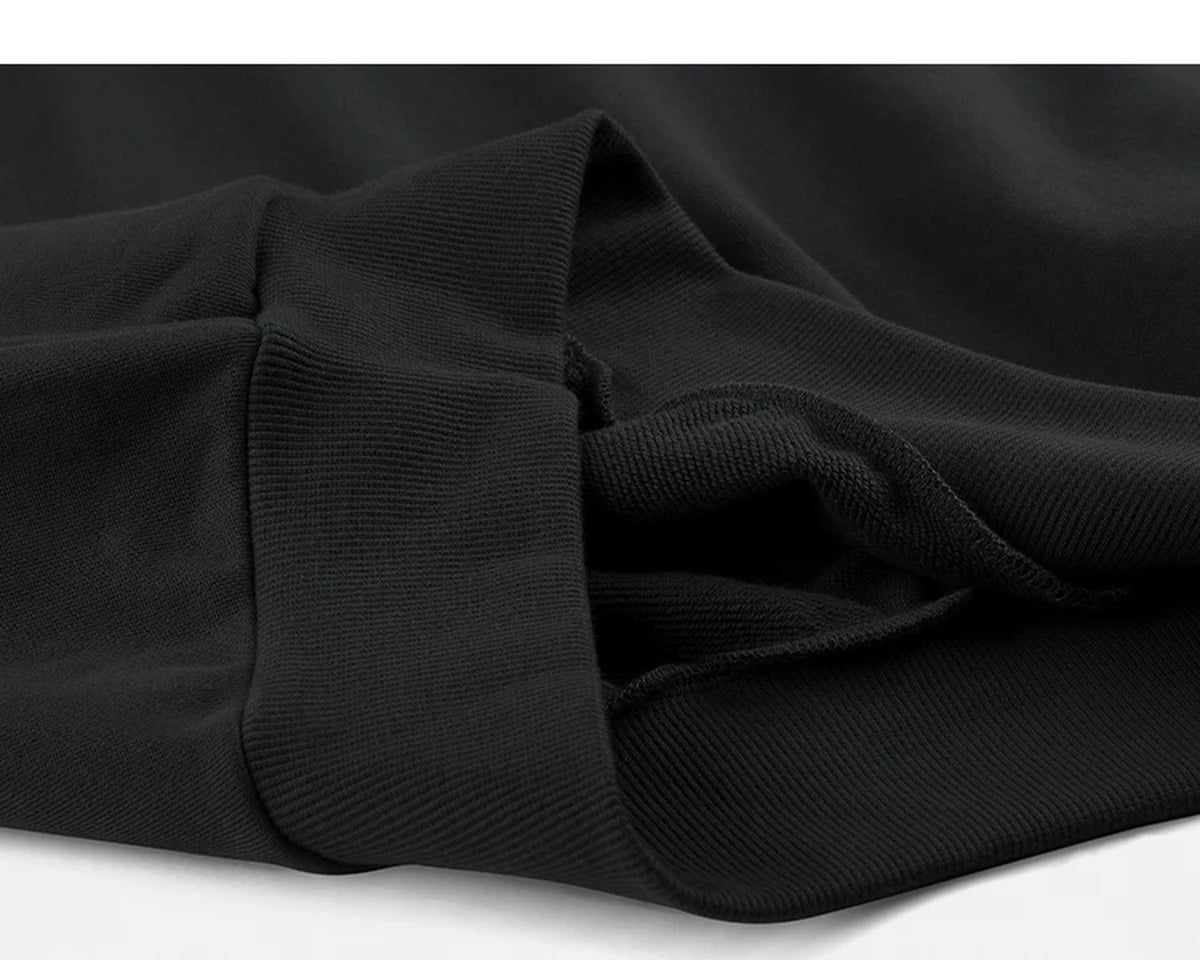 IDLT sweatshirt, black ribbed hem.