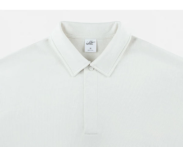 IDLT polo sweatshirt, white collar and concealed placket.