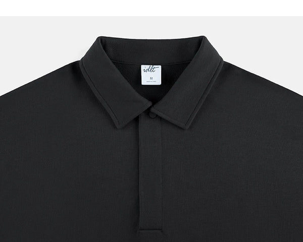 IDLT polo sweatshirt, black collar and concealed placket.