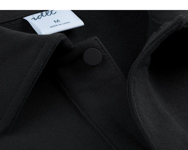 IDLT polo sweatshirt, black open collar and snap fastener.