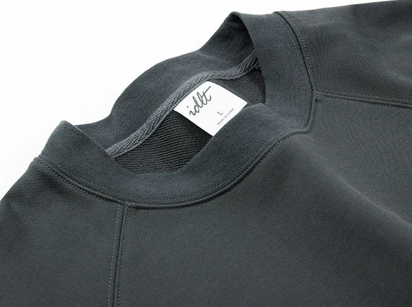 IDLT raglan sweatshirt, dark gray neckline and label.