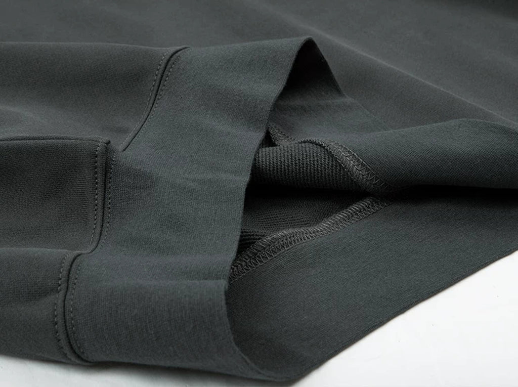 IDLT raglan sweatshirt, dark gray hem stitching.