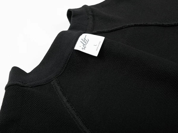 IDLT raglan sweatshirt, black inner neckline and label.