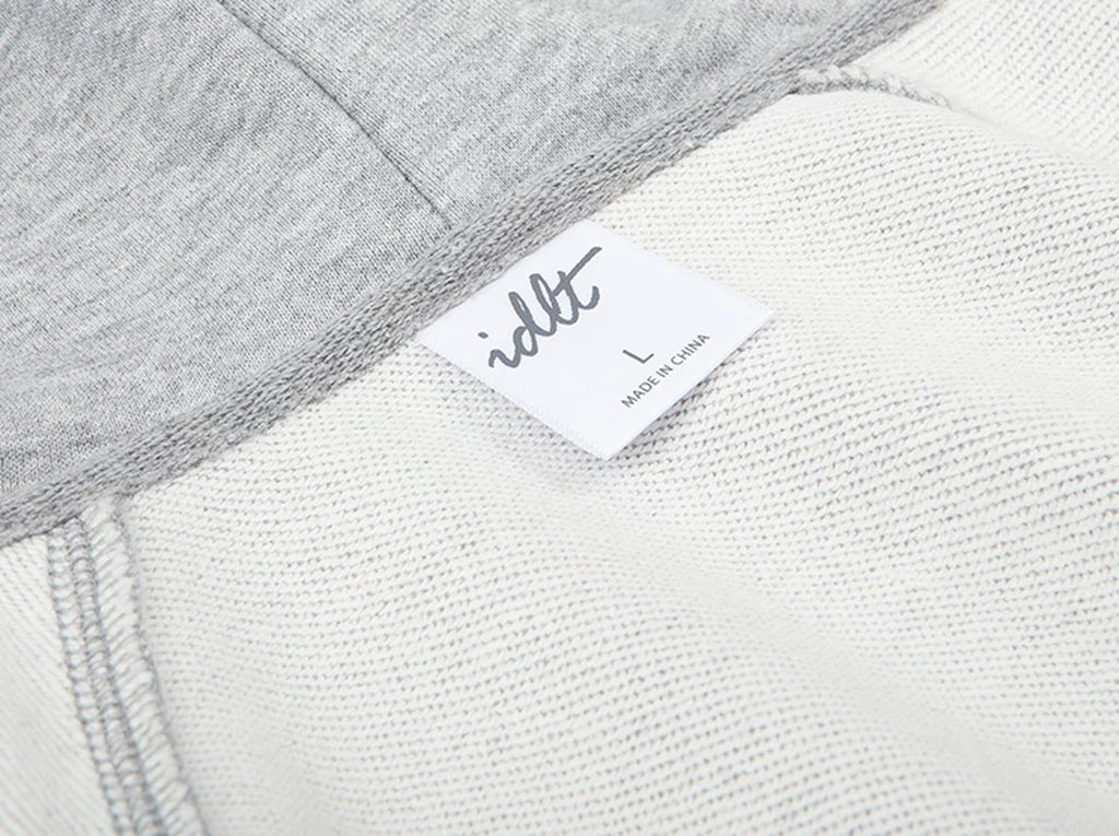 IDLT zip hoodie, heather gray inner label.