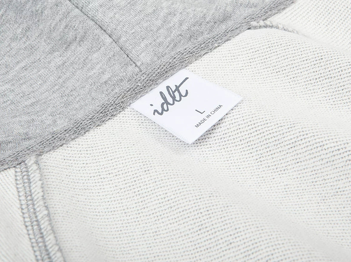 IDLT zip hoodie, heather gray inner label.