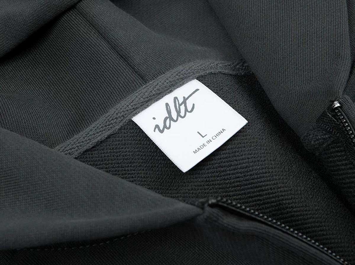 IDLT zip hoodie, dark gray hood and label.