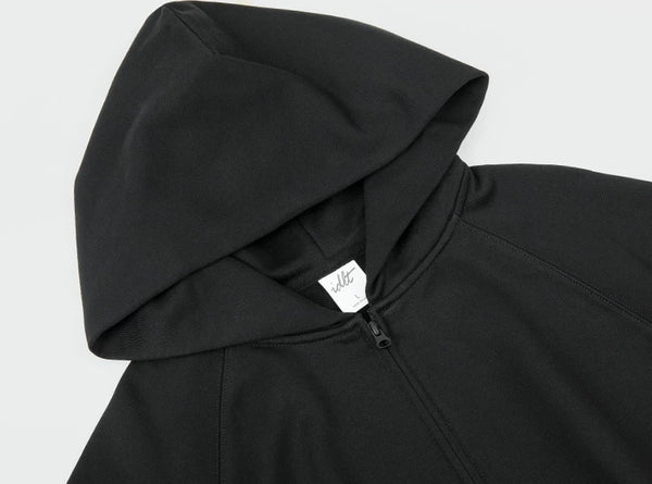IDLT zip hoodie, black hood and neckline.