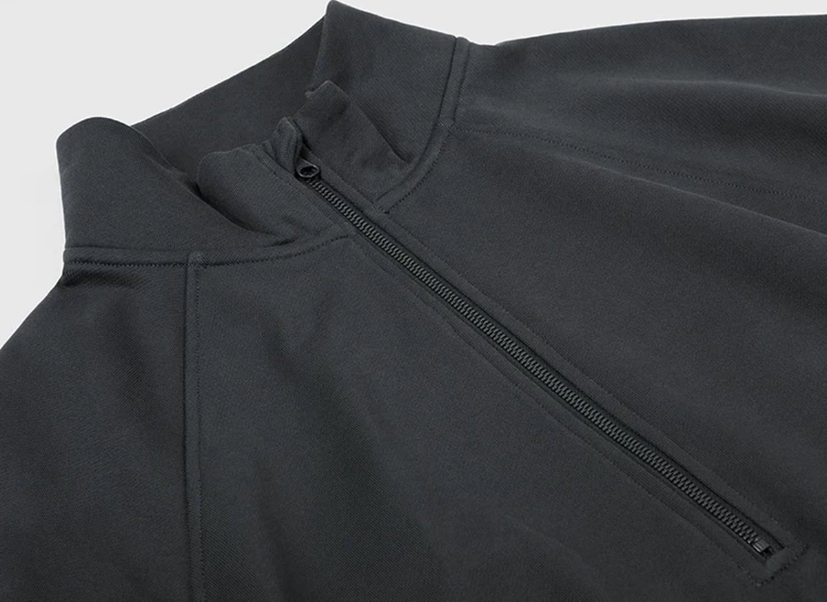 IDLT half zip sweatshirt, dark gray zipper and shoulder.