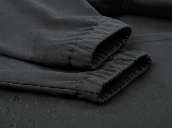 IDLT half zip sweatshirt, dark gray elastic cuffs.