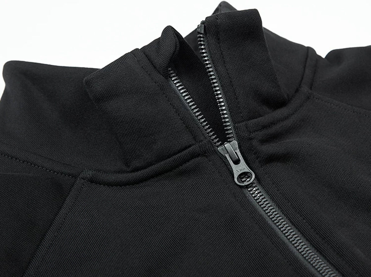 IDLT half zip sweatshirt, black open half zip neckline.
