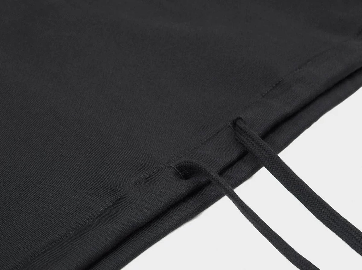 IDLT half zip sweatshirt, black hem drawstrings.