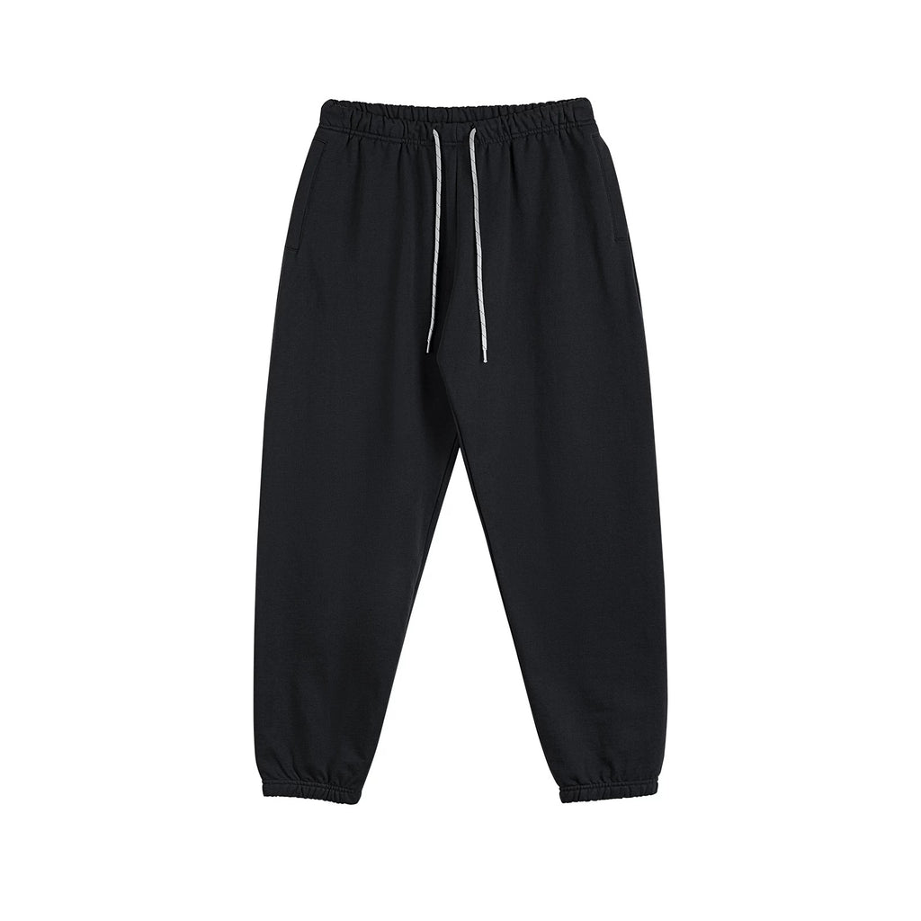 IDLT joggers, black front.