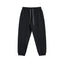 IDLT joggers, black front.