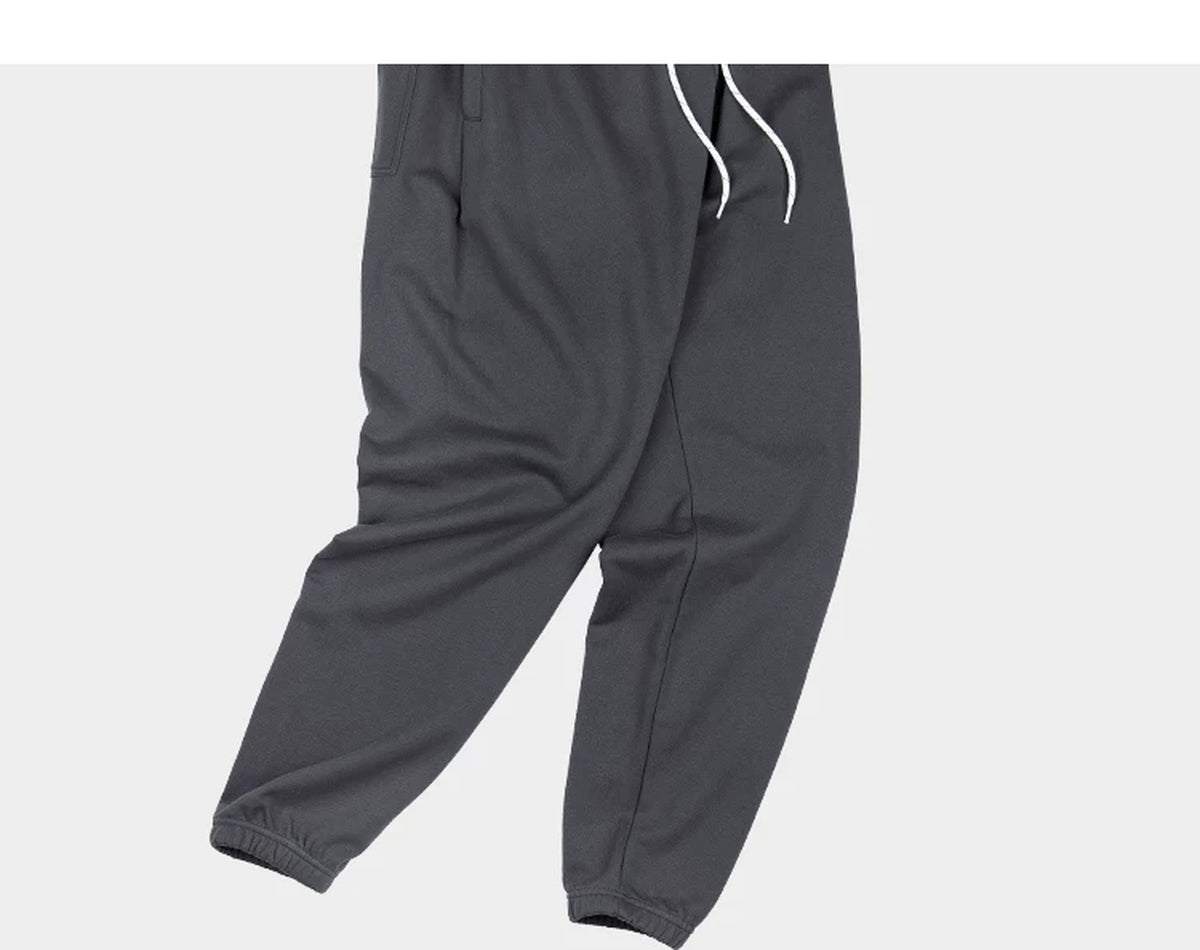 IDLT joggers, dark gray draped legs.