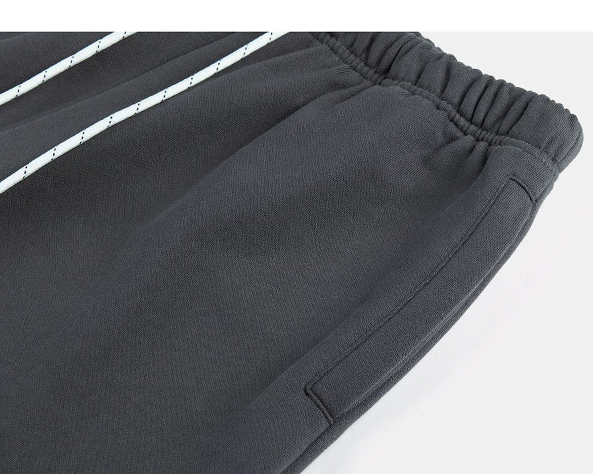 IDLT joggers, dark gray waistband and side pocket.