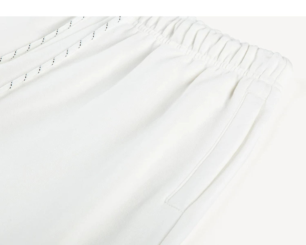 IDLT joggers, white waistband and side pocket.