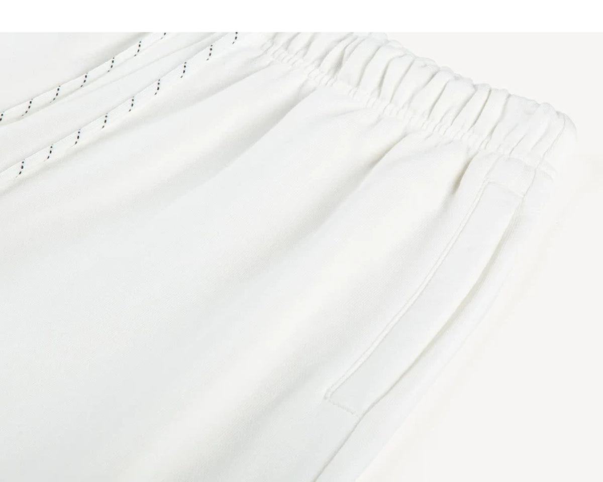 IDLT joggers, white waistband and side pocket.