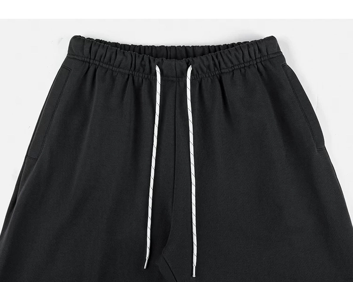 IDLT joggers, black waistband and pockets.