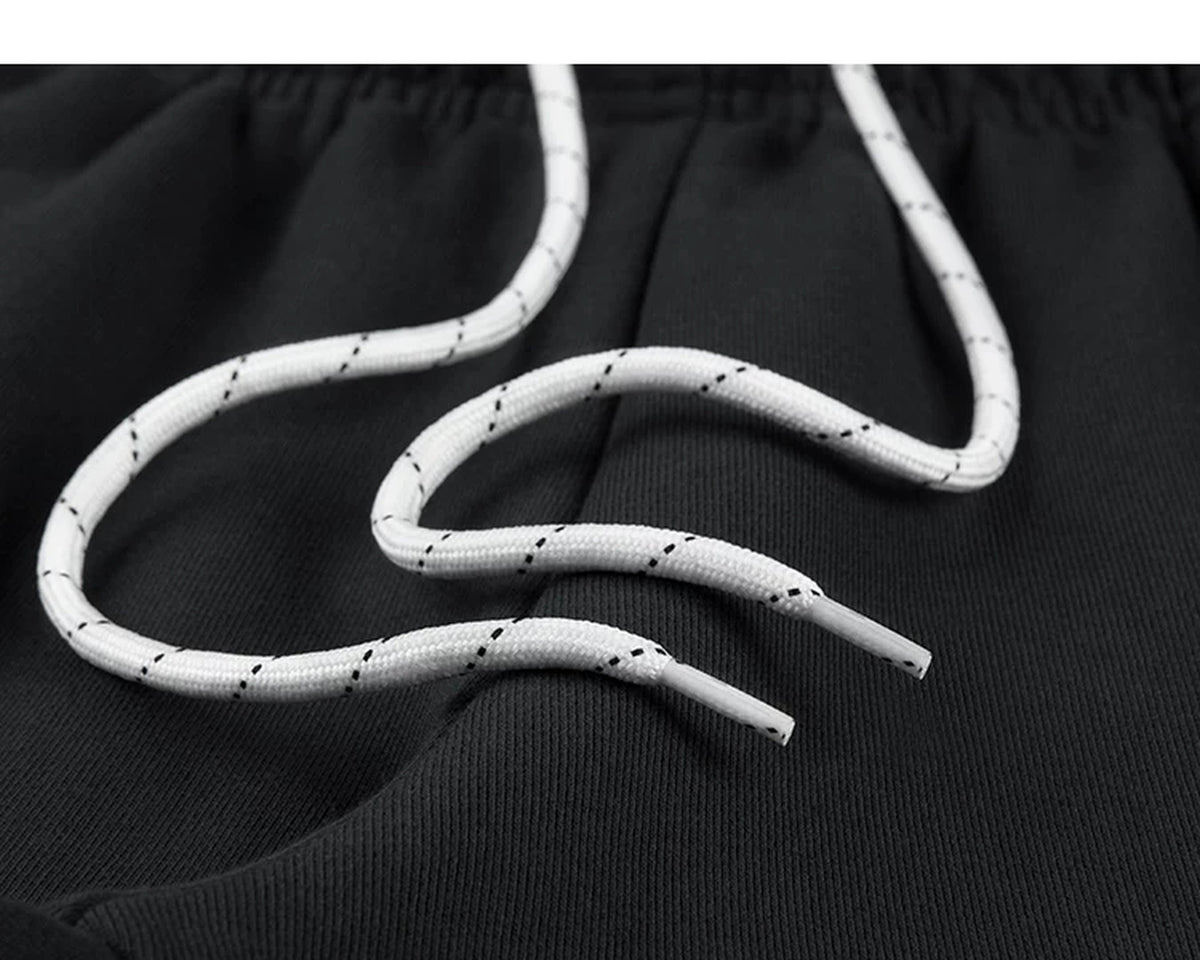 IDLT joggers, black drawstring.