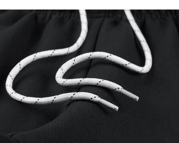 IDLT joggers, black drawstring.