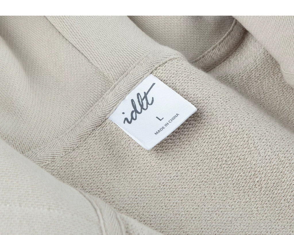 IDLT zip hoodie, beige inner neckline label.