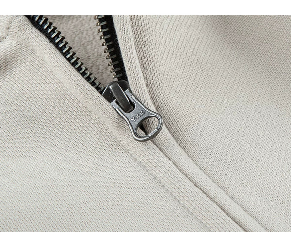 IDLT zip hoodie, beige zipper pull.