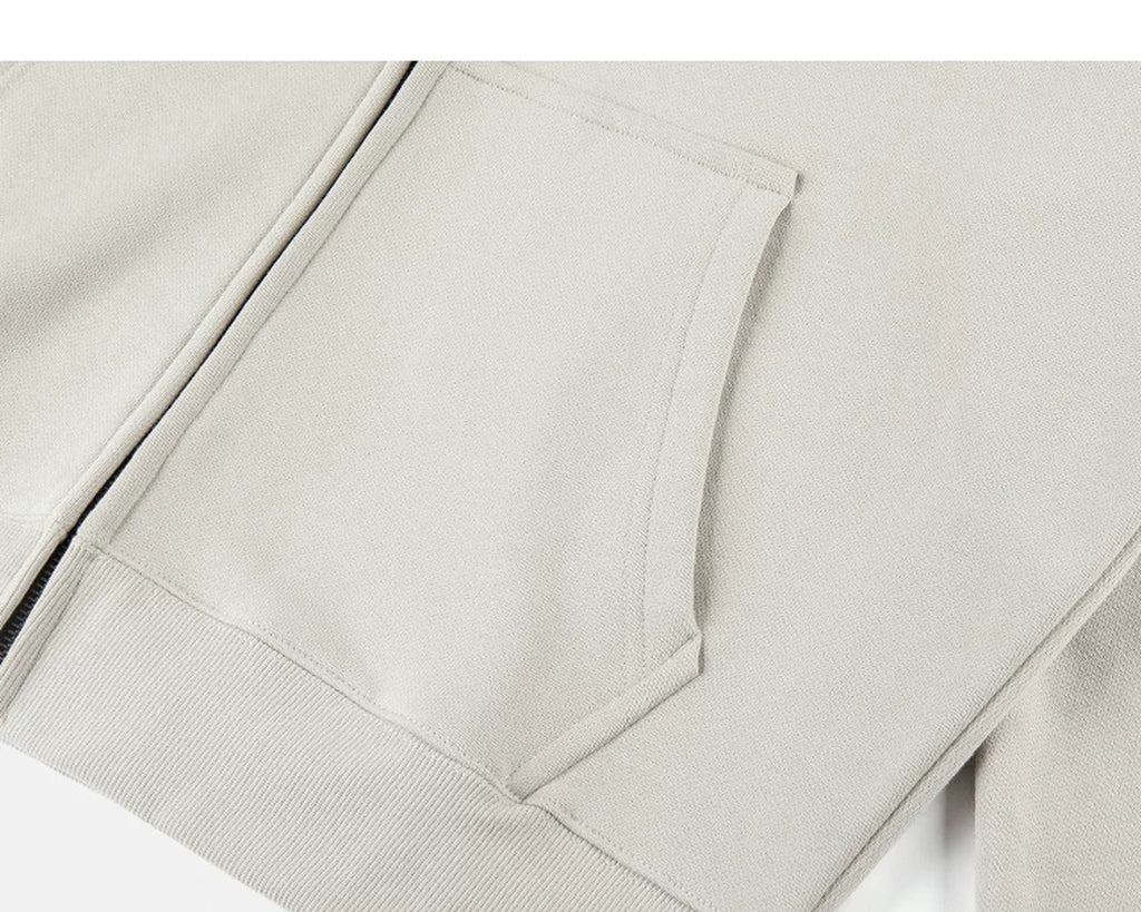 IDLT zip hoodie, beige kangaroo pocket.