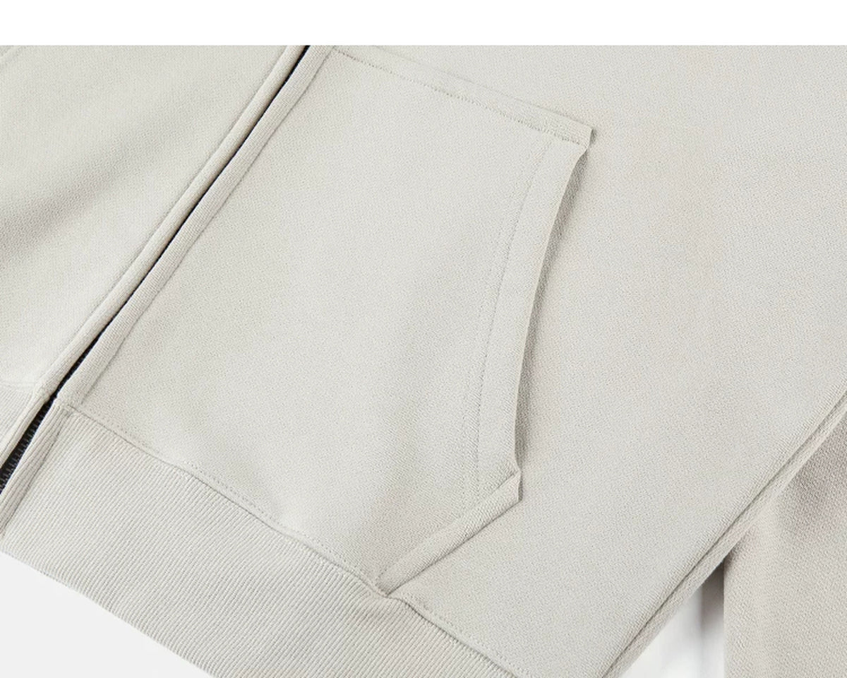 IDLT zip hoodie, beige kangaroo pocket.