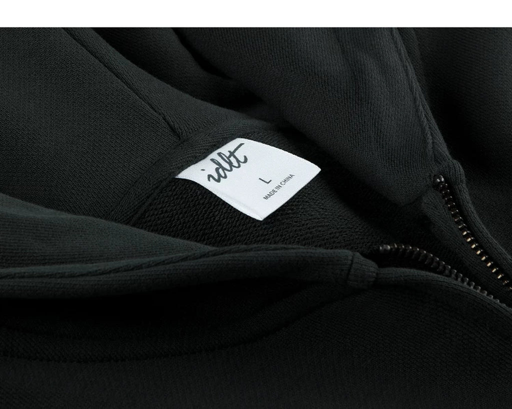 IDLT zip hoodie, black neckline label.