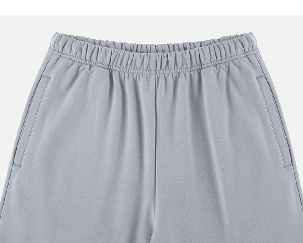 IDLT wide leg sweatpants, light gray waistband and pockets.