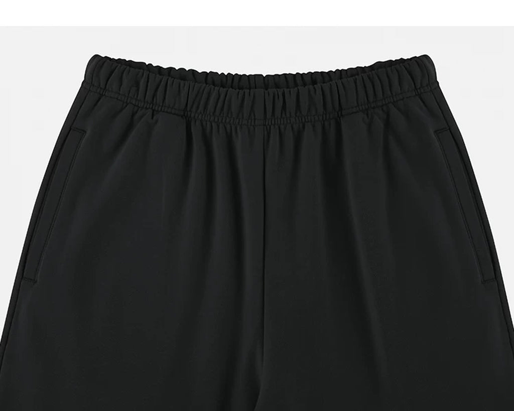 IDLT wide leg sweatpants, black waistband and pockets.