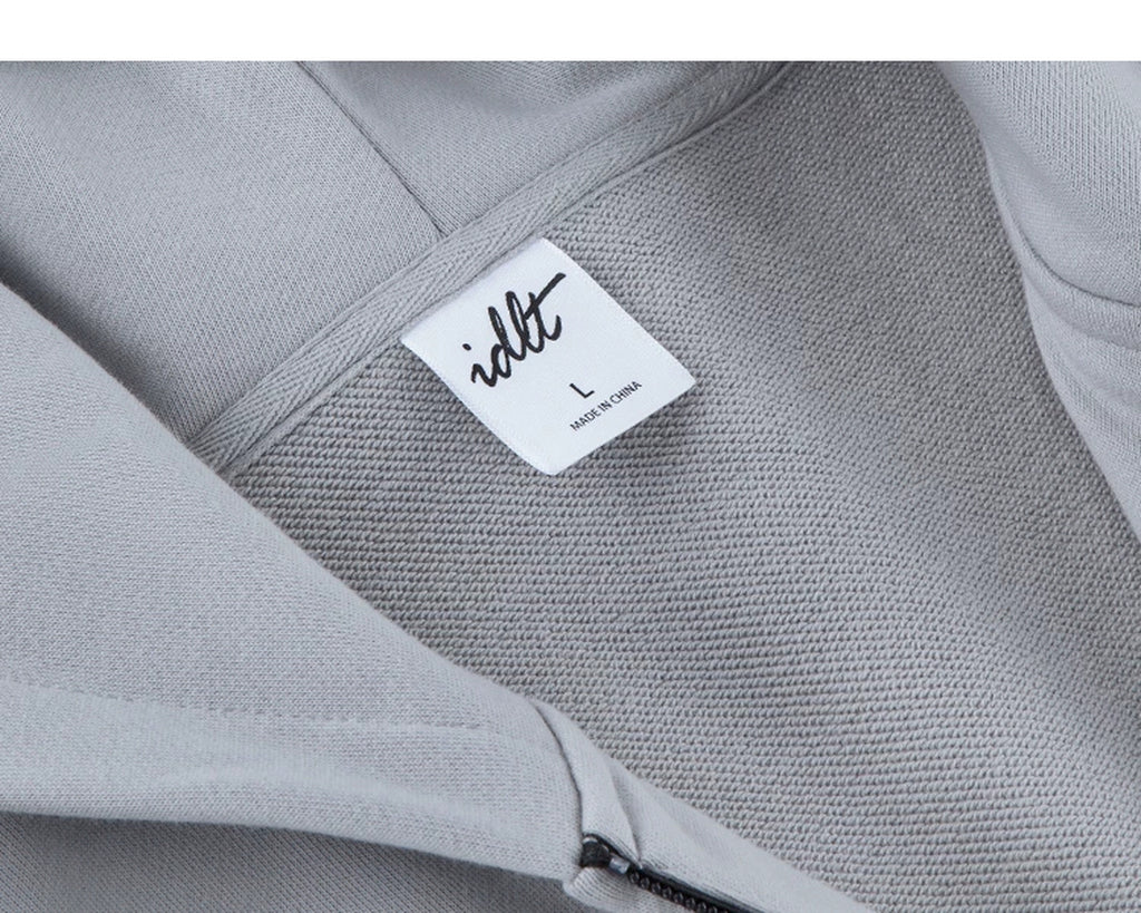 IDLT zip hoodie, light gray neckline label.