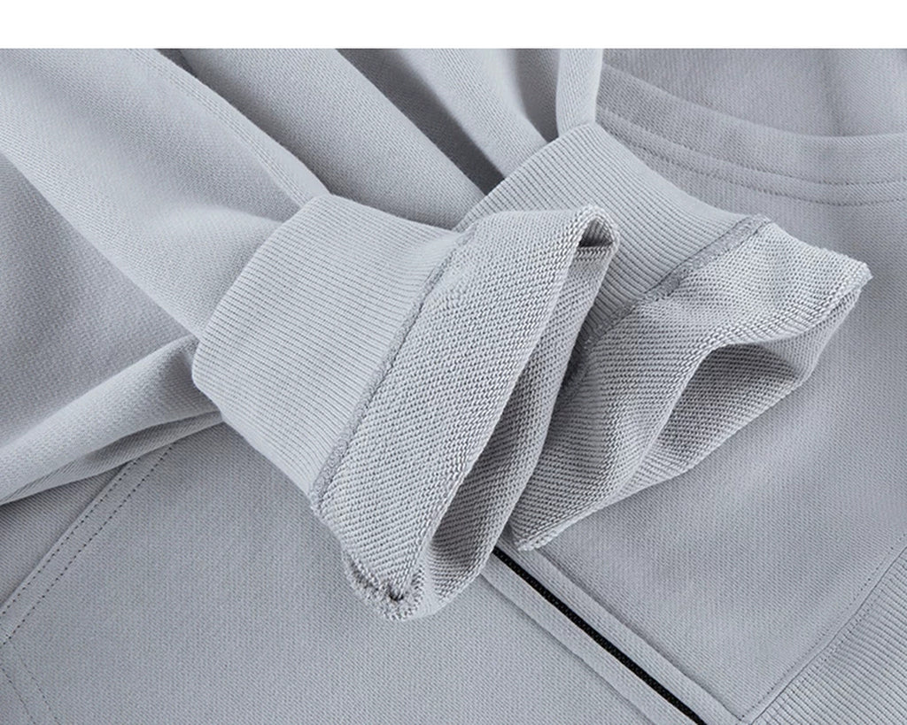 IDLT zip hoodie, light gray turned cuffs.