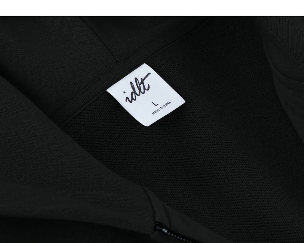 IDLT zip hoodie, black neckline label.