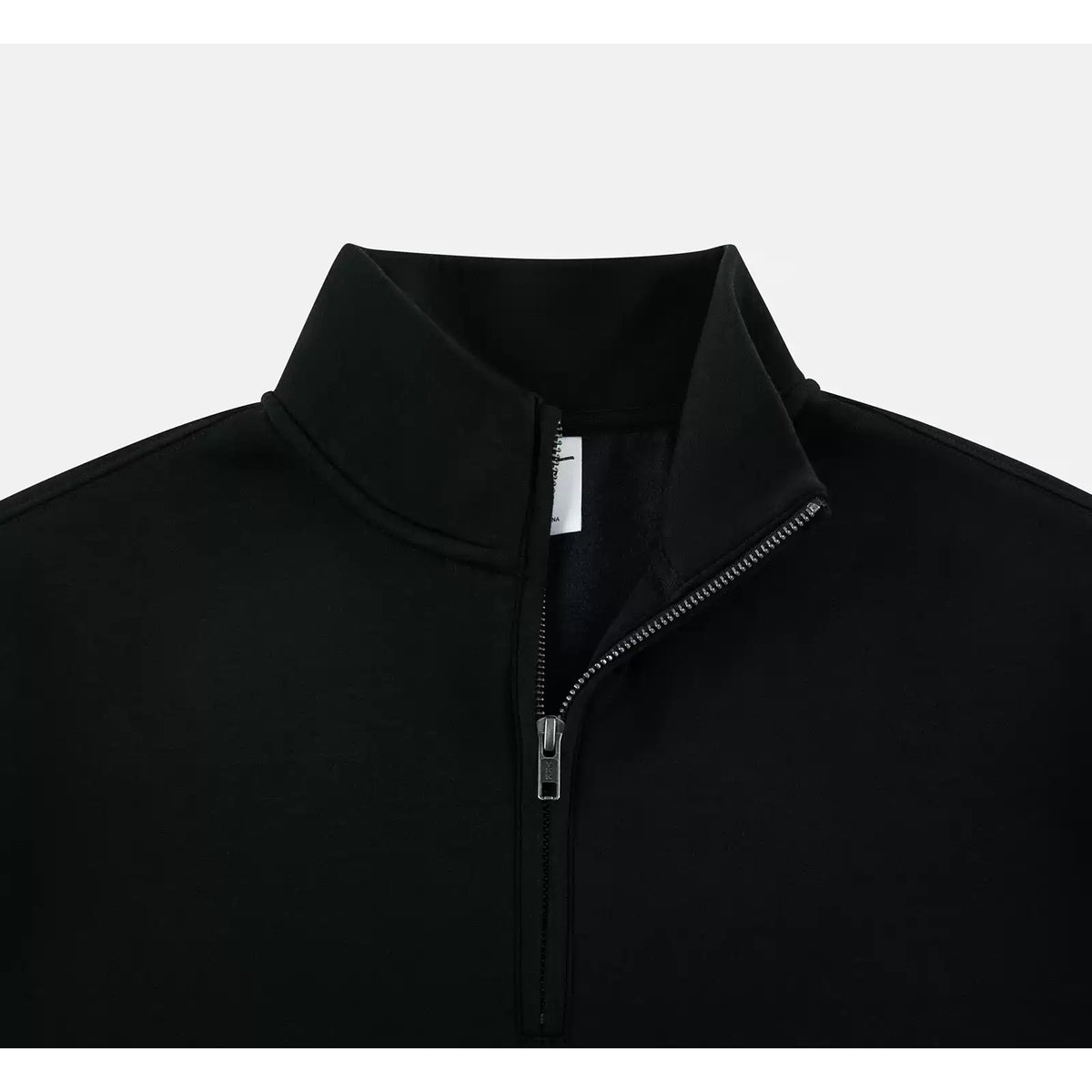 IDLT half zip sweatshirt, black open collar.