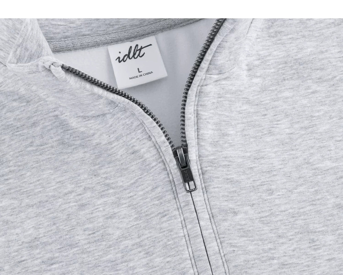 IDLT half zip sweatshirt, heather gray open zipper and label.