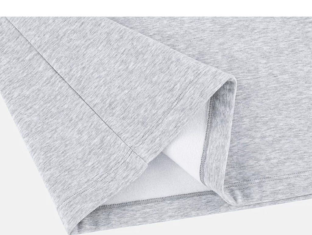IDLT half zip sweatshirt, heather gray folded hem.