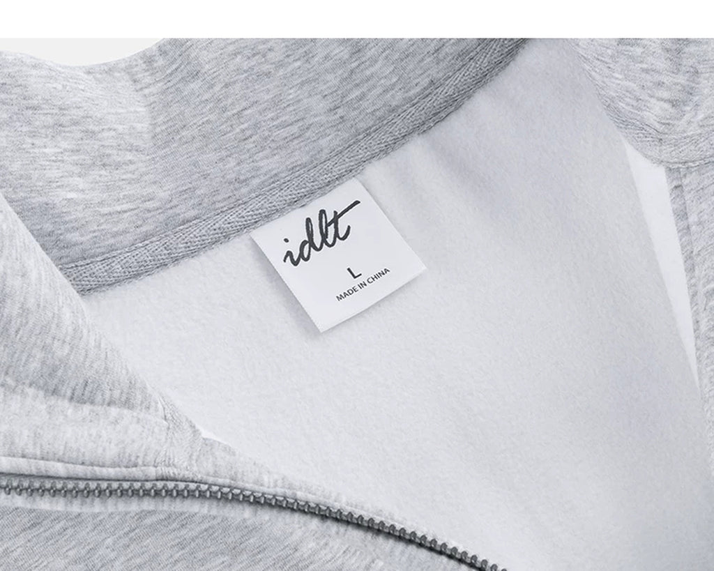 IDLT half zip sweatshirt, heather gray inner neckline label.