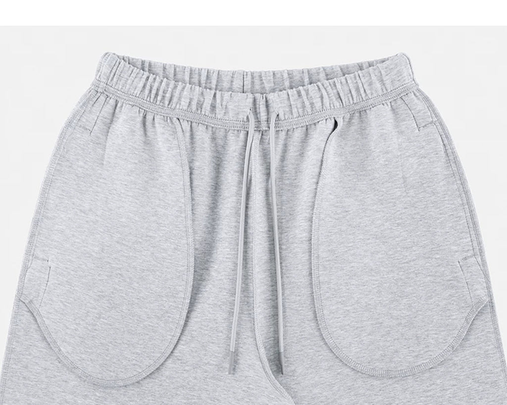 IDLT wide leg sweatpants, heather gray inner waistband and pockets.