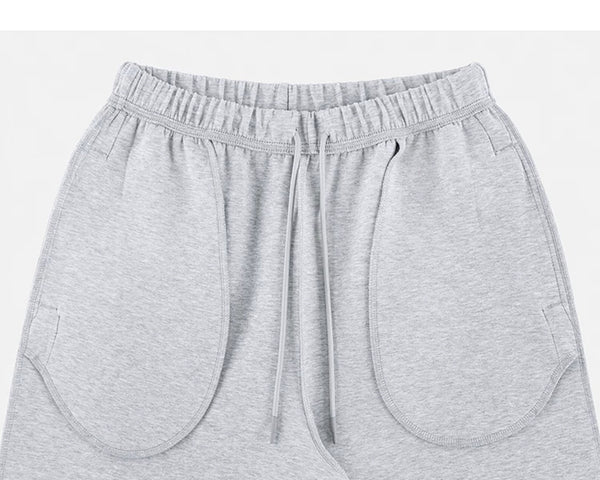 IDLT wide leg sweatpants, heather gray inner waistband and pockets.